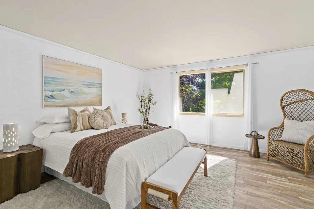 High-end property photography retouching example of a bedroom, featuring real estate image enhancement and virtual home staging services.