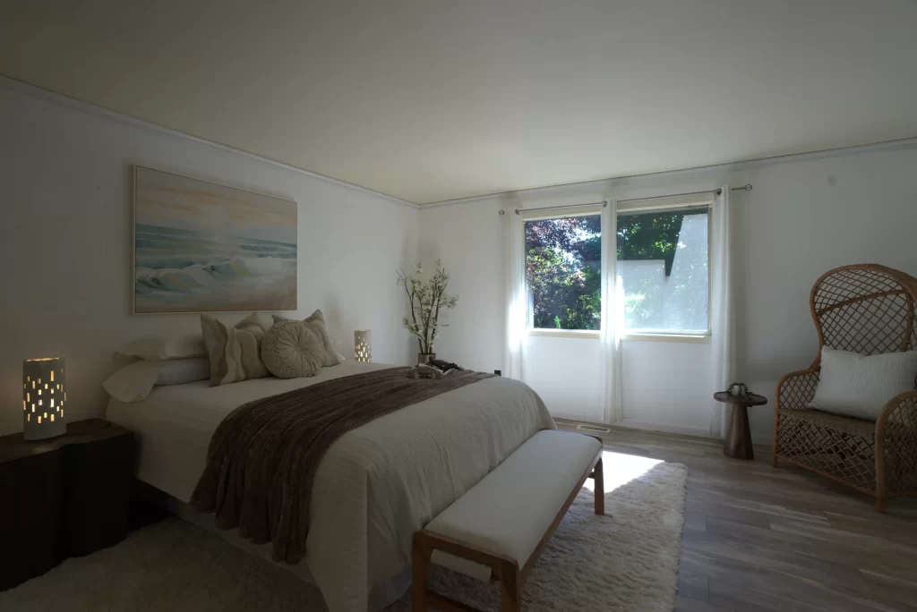 High-end property photography editing example of a bedroom, featuring real estate image enhancement and virtual home staging services.